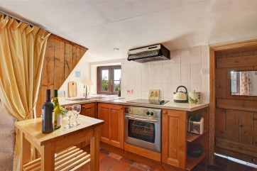 Kitchen with electric hob and oven