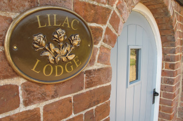 Courtyard garden with table, chairs and a barbecue, ideal for al fresco dining