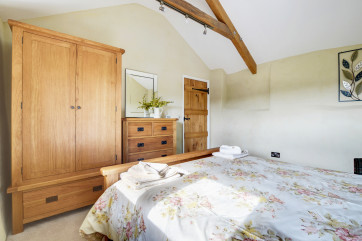 An attractive bedroom with Kingsize bed and shower room complete the internal accommodation