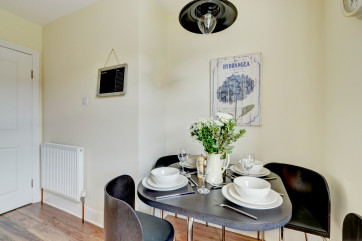 The compact dining table in the kitchen