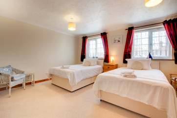 The twin room is light and bright with double aspect windows