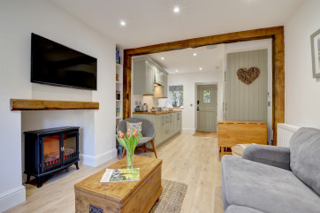 Fox cottage has a modern contemporary style yet the original character of this 17th century cottage can still be seen in the beams and inglenook fireplace
