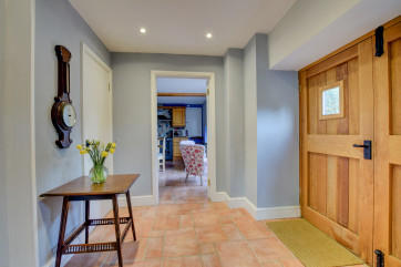 Entrance hall with feature wooden entrance doors