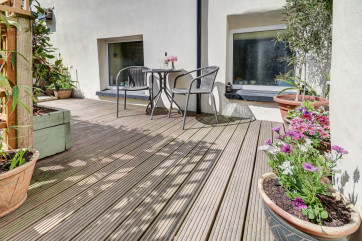 A well thought out fully enclosed terraced patio and garden offers a lovely space to enjoy breakfast or relax after a day exploring the area