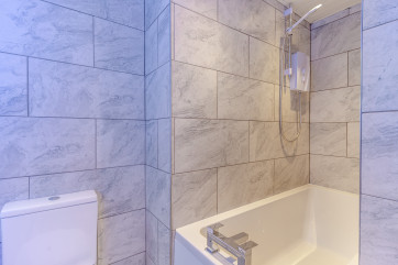  shower over bath at Hafan y Ddinas Cardiff Apartment 2