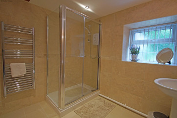  The first bathroom is downstairs and has a shower.