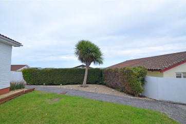Set quietly among similar properties, the bungalow is within easy reach of all the facilities of the seaside village of Westward Ho! 