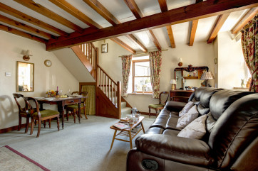 The comfortable lounge with reclining sofa and chairs