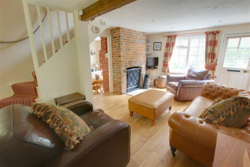 Warm, welcoming and child friendly cottage with very comfortable sitting room - with a real open fire