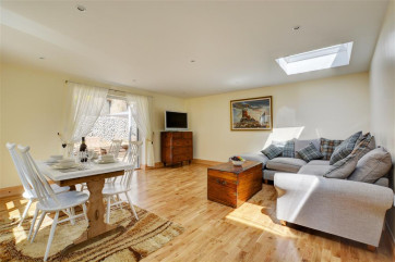 Spacious room with sitting and dining areas