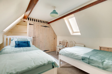 A cosy twin bedded room with velux windows on the top floor, ideal for youngsters. 