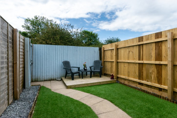 Rear garden with table and chairs