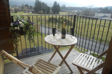 South facing balcony with furniture to enjoy the sun all day long.