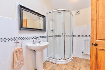 Master bedroom ensuite with corner shower