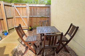 The rear courtyard and patio furniture