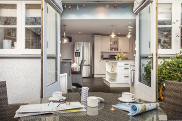 Open the kitchen French doors and enjoy outdoor courtyard ambience
