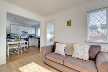 Open plan sitting room and kitchen