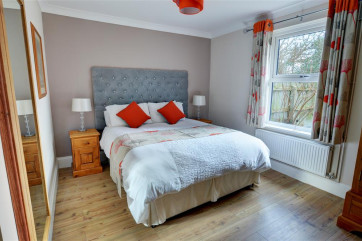 Main bedroom with a double bed