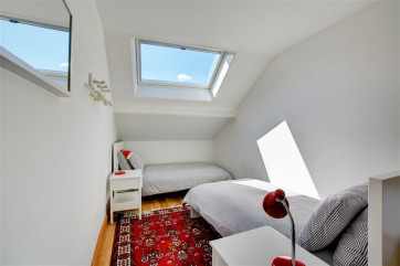 Bedroom two is a twin room with en suite shower room