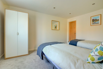 Bedroom 3 showing twin beds and wardrobe