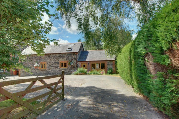 Located within the grounds of the owner's own home and just a 15 minute walk from the delightful village of Landkey