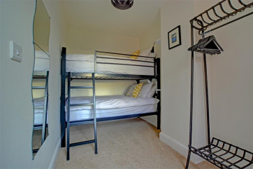 Bunk beds within bedroom three 
