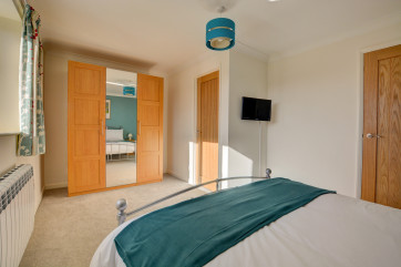 Bedroom 1 showing storage 