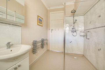 Wet Room with shower cubicle, wash basin and wc