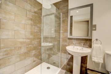 Bedroom 4 En-Suite with walk in shower, washbasin and wc