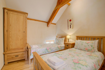 The cosy twin bedded room