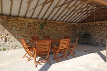 With seating for seven.  Perfect for barbecues and eating al fresco on rainy days.