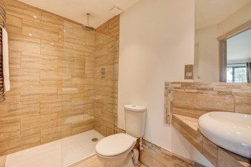Bedroom 3 En-Suite with walk in shower, washbasin and wc