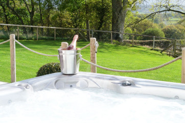 Stunning large hot tub with amazing views across the valley.