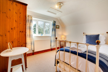 The single bedroom is a quite haven with a sunny outlook