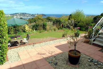 Harbour Lights Torquay - Lower terrace leading to lawned garden and decking
