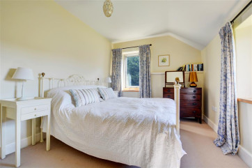 Bedroom three has a king sized bed