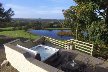 Hot-tub with views over the lake and surrounding countryside