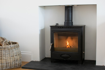 Wood burner in the reading room
