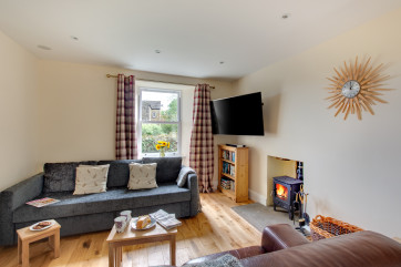 Snug with Smart TV, woodburning stove, a cosy room