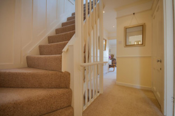 First floor landing & stairs leading up to the top floor and two further bedrooms