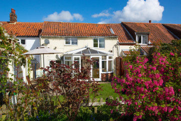 Shamrock Cottage is a traditional Norfolk brick and flint cottage offering spacious and comfortable accommodation. Quietly situated within this pretty village it has the benefit of a large south-facing garden