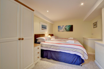 The 2nd bedroom has zip n link beds that convert into a superking on request