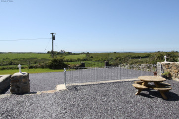 The patio is perfectly located to capture the sea & countryside views