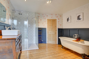 Second floor bathroom with double ended bath and walk-in shower