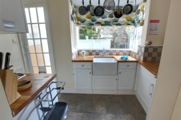 Quirky and clever - the kitchen has been carefully designed to work well but keep the character of the cottage