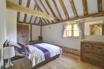 Lovely double bedroom with tasteful furnishings.