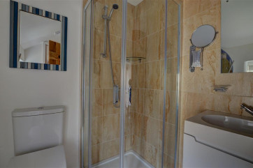 The upstairs bathroom with shower