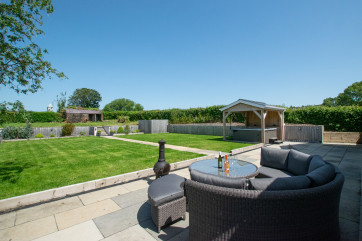 Rear garden and hot tub