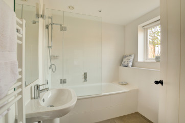 Comprising of a bath, over bath shower, wc and washbasin