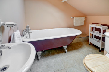 The en suite bathroom with claw foot bath